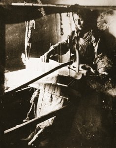 Woman at the loom, Middle Volga, c.1885 by Russian Photographer